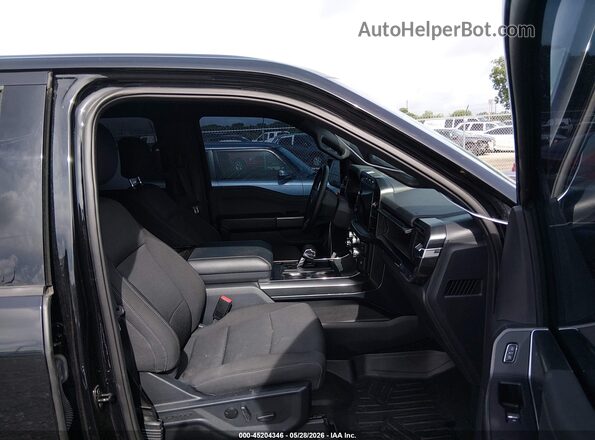 1FTFW1ED6PFD08498 2023 FORD F150 Black Vista interior delantera