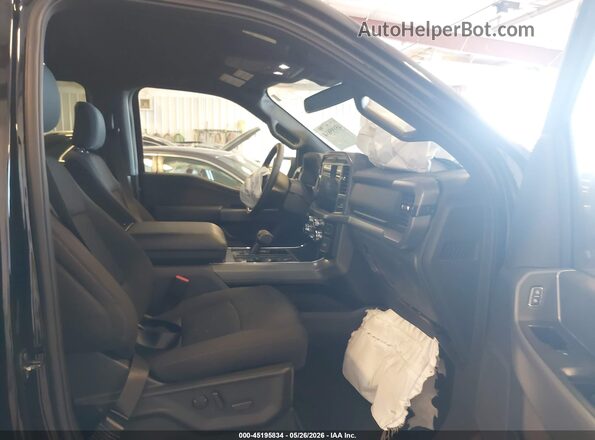 1FTFW3L54TFA53335 2026 FORD F150 Black Widok wnętrza z przodu