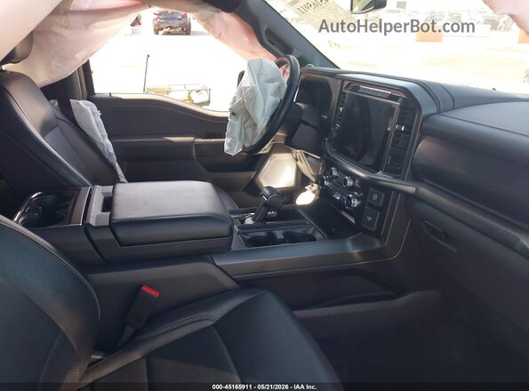 1FTFW5LD0RFB48244 2024 FORD F150 Серый Вид салона спереди