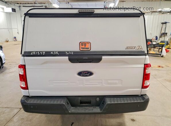 1FTMF1CB1PKE69390 2023 FORD F150 White Вид ззаду