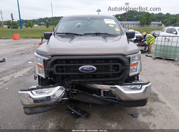 1FTMF1EP4NKD72030 2022 FORD F150 Brown Vista frontal