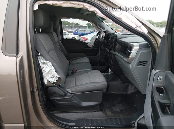 1FTMF1EP4NKD72030 2022 FORD F150 Brown Vista interior delantera