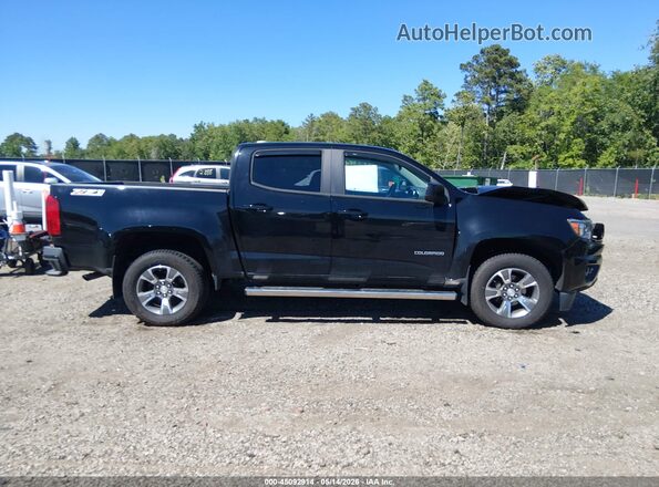 1GCGTDEN4J1143174 2018 CHEVROLET COLORADO Black Widok wnętrza z tyłu