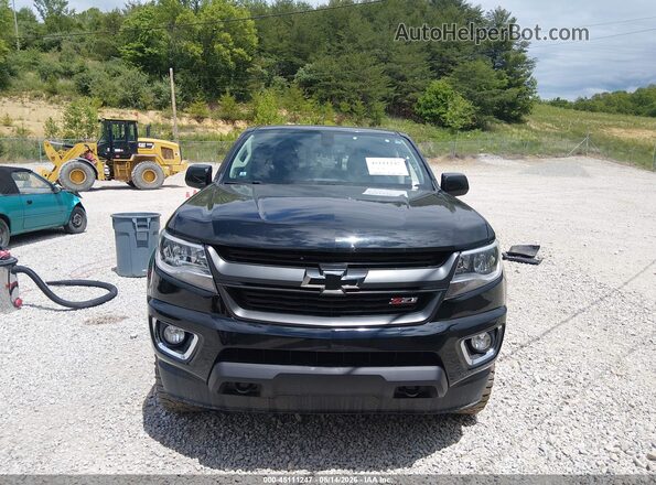1GCGTDEN7H1318558 2017 CHEVROLET COLORADO Black Widok wnętrza z tyłu