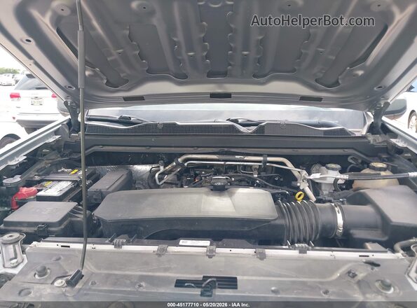 1GCPTBEK3P1150569 2023 CHEVROLET COLORADO Silver Rear view