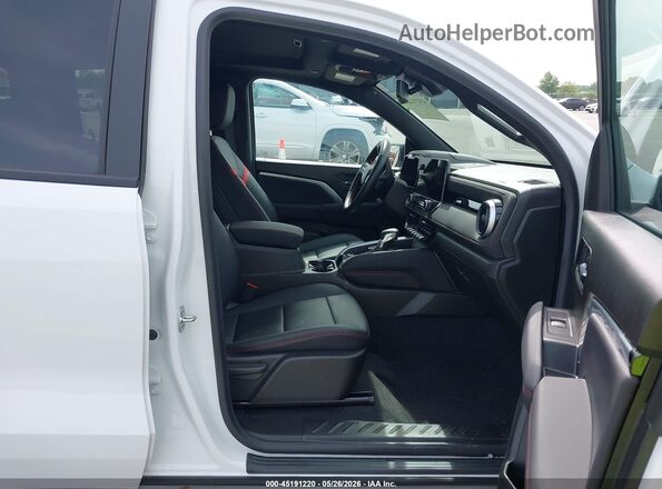 1GCPTDEK9S1208642 2025 CHEVROLET COLORADO White Вид салону спереду