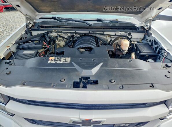 1GCVKREC0GZ140644 2016 CHEVROLET SILVERADO White Widok wnętrza z tyłu