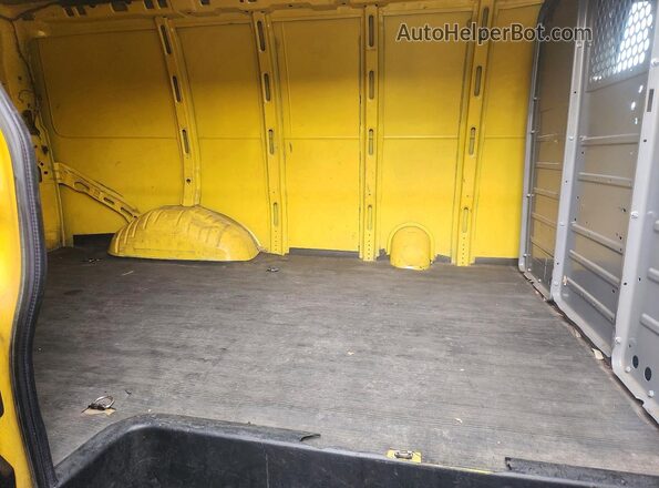 1GCWGAFP9K1338946 2019 CHEVROLET EXPRESS Yellow Rear interior view