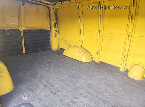 1GCWGAFP9K1338946 2019 CHEVROLET EXPRESS Yellow Rear seats view