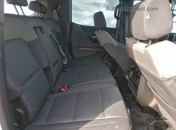 1GKB0RDCXRU114261 2024 GMC HUMMER Белый Вид задней части салона