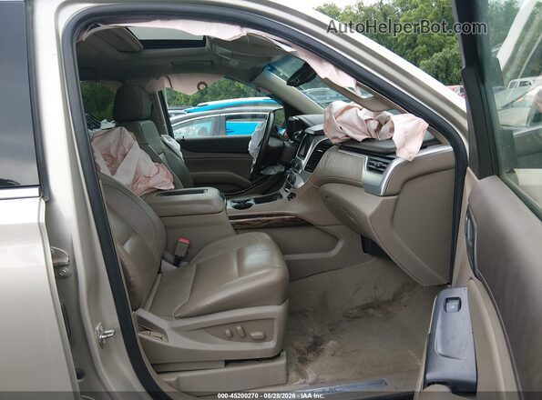 1GKS2BKC1GR345974 2016 GMC YUKON Бежевый Вид салона спереди
