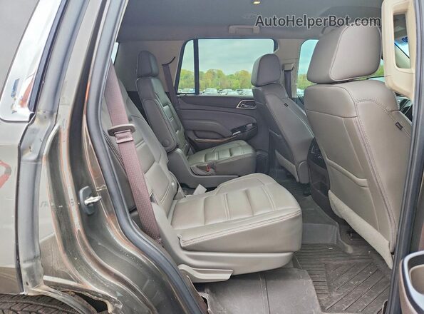 1GKS2CKJ3KR321981 2019 GMC YUKON Tan Widok wnętrza z tyłu