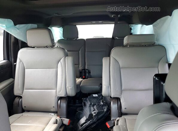 1GKS2GKDXPR201751 2023 GMC YUKON Gold Widok tylnych siedzeń