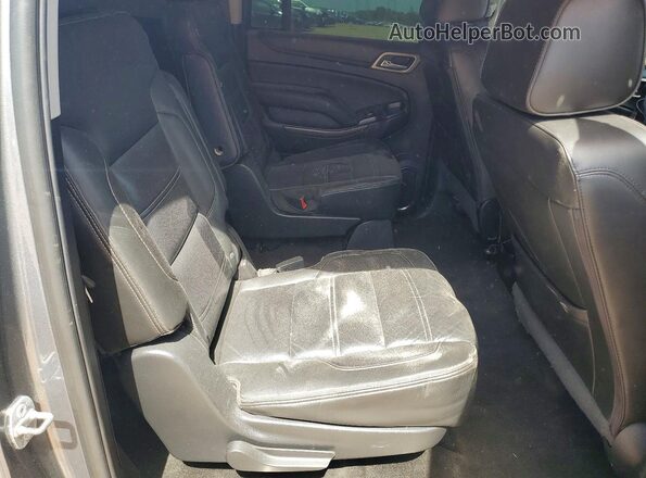 1GKS2HKJ2JR362016 2018 GMC YUKON Gray Vista interior trasera
