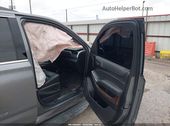 1GNSCBKC0LR174998 2020 CHEVROLET TAHOE Серый Вид салона спереди