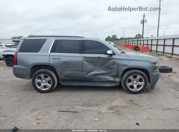 1GNSCBKC0LR174998 2020 CHEVROLET TAHOE Серый Вид задней части салона