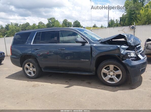 1GNSCBKC9KR169183 2019 CHEVROLET TAHOE Gray Vista interior trasera