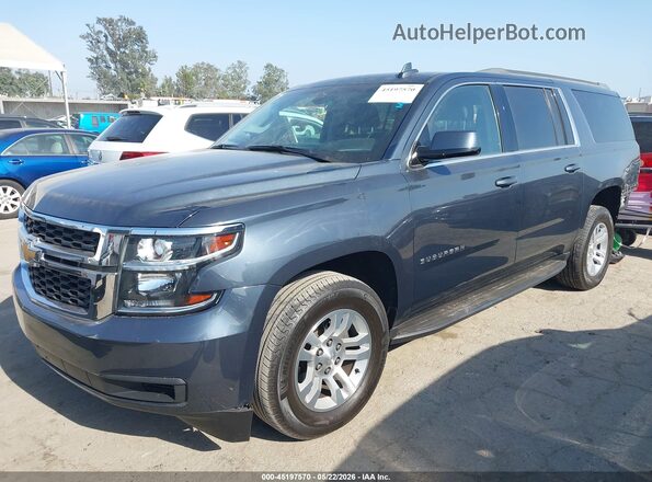 1GNSCGKC1LR123409 2020 CHEVROLET SUBURBAN Черный Передняя левая четверть