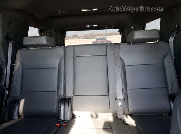 1GNSCLEDXPR330108 2023 CHEVROLET TAHOE Белый Вид задних сидений
