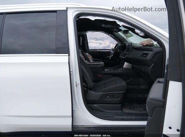 1GNSCMKD7PR456839 2023 CHEVROLET TAHOE Белый Вид салона спереди