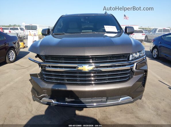 1GNSCNKDXMR377991 2021 CHEVROLET TAHOE Brown Սալոնի հետևի տեսք