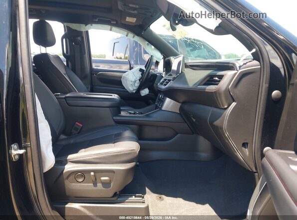 1GNSCRKD0PR206937 2023 CHEVROLET TAHOE Черный Вид салона спереди