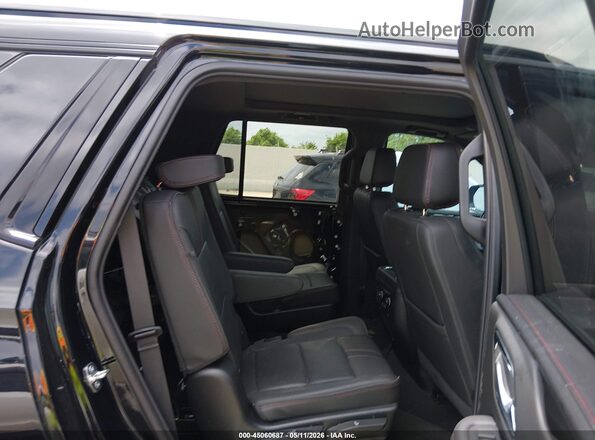1GNSCRKD1RR169500 2024 CHEVROLET TAHOE Black VIN sticker view