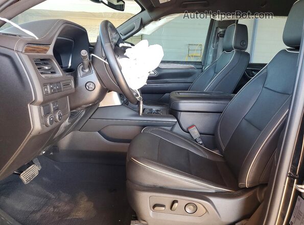 1GNSCSKD7PR264910 2023 CHEVROLET TAHOE Черный Вид салона спереди