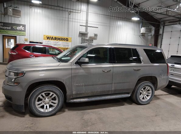 1GNSKAEC4JR140021 2018 CHEVROLET TAHOE Gray უკანა სალონის ხედი