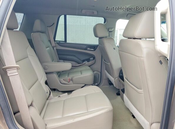 1GNSKBKC0GR297239 2016 CHEVROLET TAHOE Tan Widok wnętrza z tyłu
