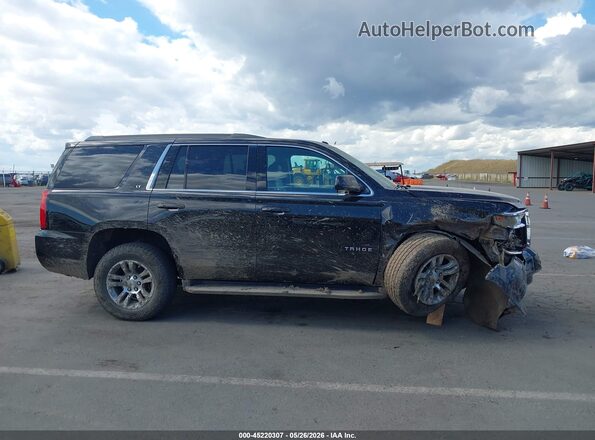 1GNSKBKC0JR146943 2018 CHEVROLET TAHOE Black Widok wnętrza z tyłu
