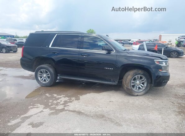 1GNSKBKC0JR338721 2018 CHEVROLET TAHOE Black უკანა სალონის ხედი