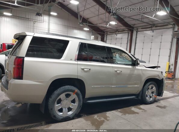 1GNSKBKC7GR320287 2016 CHEVROLET TAHOE Gold Widok wnętrza z tyłu