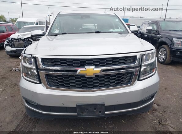 1GNSKBKC8GR124164 2016 CHEVROLET TAHOE Silver Widok wnętrza z tyłu