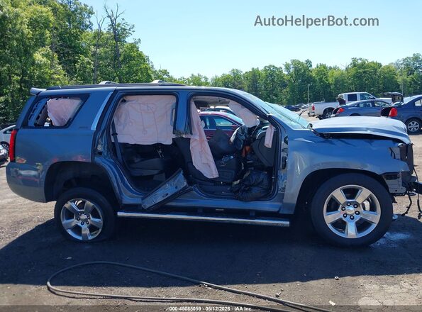 1GNSKBKC8GR286022 2016 CHEVROLET TAHOE Light Blue Rear interior view