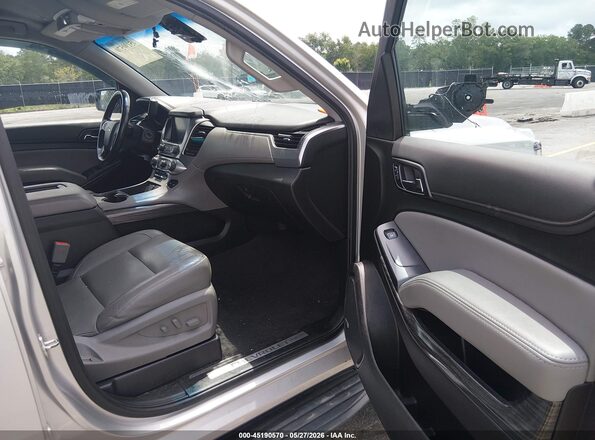 1GNSKBKCXLR246227 2020 CHEVROLET TAHOE Серебряный Вид салона спереди