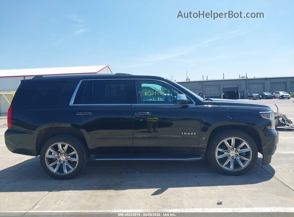 1GNSKCKC1JR279264 2018 CHEVROLET TAHOE Black Widok wnętrza z tyłu