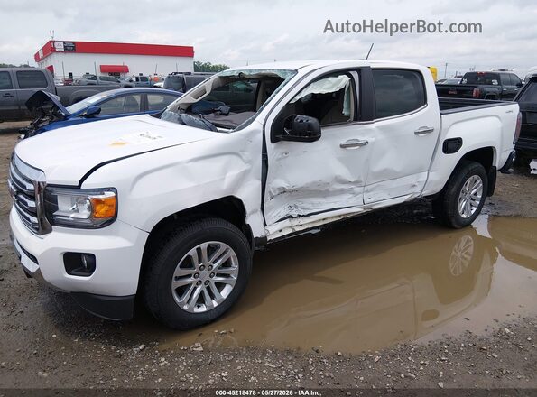 1GTG6DEN2K1132425 2019 GMC CANYON White Vista tres cuartos delantera izquierda