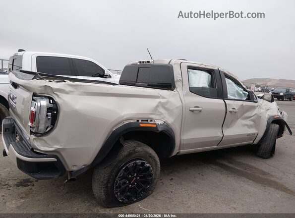 1GTP1BEK6T1160741 2026 GMC CANYON Tan Սալոնի հետևի տեսք