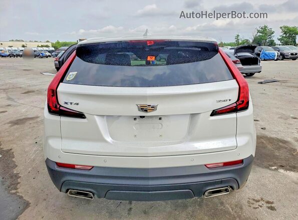 1GYAZAR44MF035367 2021 CADILLAC XT4 White Вид ззаду