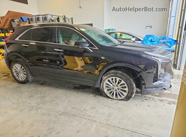 1GYAZAR46RF169563 2024 CADILLAC XT4 Black 
