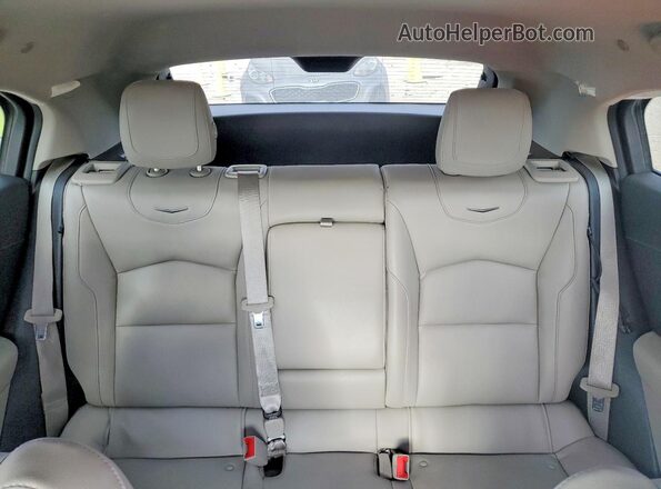 1GYAZAR49MF049975 2021 CADILLAC XT4 Black Rear seats view