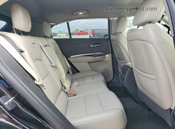 1GYAZAR49MF049975 2021 CADILLAC XT4 Black Rear interior view