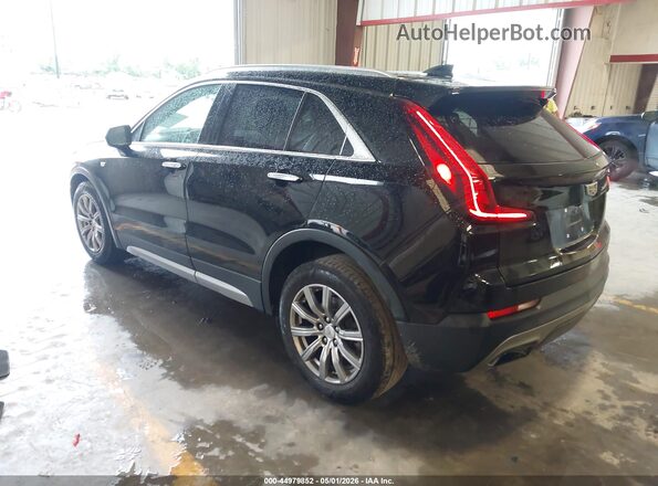 1GYFZCR49KF149122 2019 CADILLAC XT4 Black Trasero izquierdo