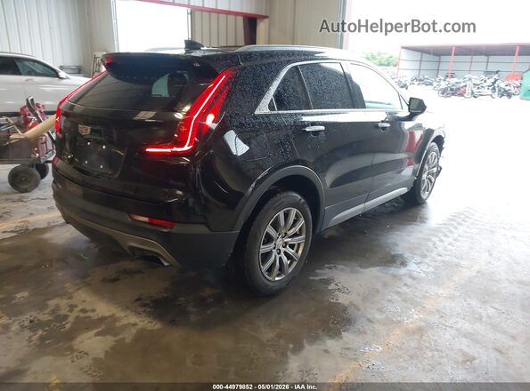 1GYFZCR49KF149122 2019 CADILLAC XT4 Black Trasero derecho