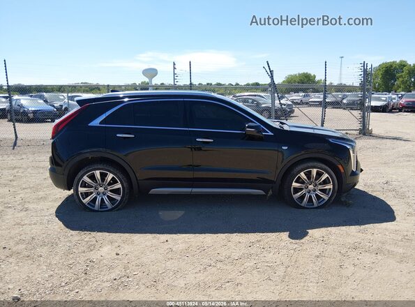 1GYFZDR40KF130464 2019 CADILLAC XT4 Black Սալոնի հետևի տեսք
