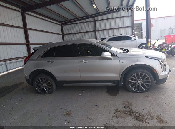 1GYFZDR40KF168633 2019 CADILLAC XT4 Серебряный Вид задней части салона