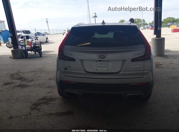 1GYFZDR40KF168633 2019 CADILLAC XT4 Серебряный 