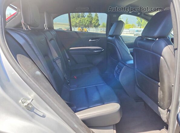 1GYFZDR40MF005418 2021 CADILLAC XT4 Silver Rear seats view