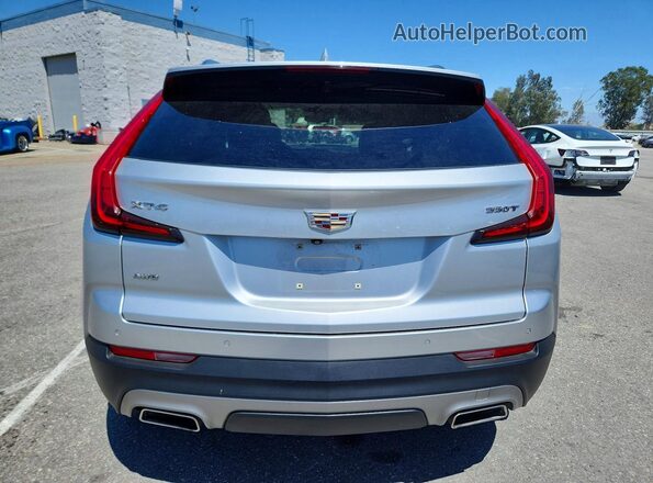 1GYFZDR40MF005418 2021 CADILLAC XT4 Silver Rear view